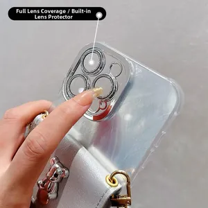 Close-up of iPhone case with silver bear coin purse and integrated camera lens protection