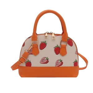 Trendy semi-circular strawberry print handbag with orange trim and gold hardware details