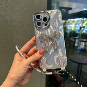 Silver bow smartphone case with pearl texture and detachable wrist strap for iPhone