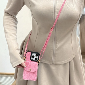 Pink snakeskin pattern phone case with card slot and crossbody strap for iPhone