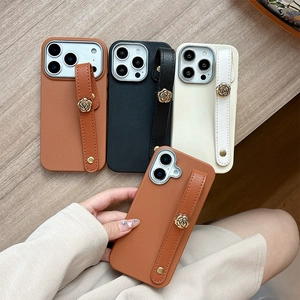 Lychee Grain Leather Phone Case With Metal Camellia Flower Wristband Hand Strap Soft TPU Shockproof Shell For Women