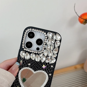 Detail of rhinestone luxury phone case with heart mirror and lace leather for iPhone
