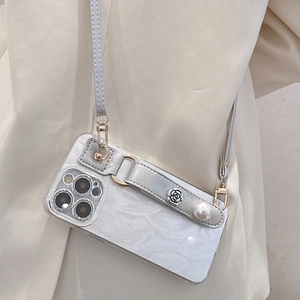 White marble iPhone case with floral pearl wrist strap and crossbody shoulder strap