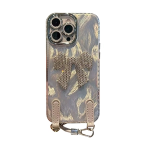 Silver bowknot iPhone case with sparkling rhinestones and detachable shoulder strap