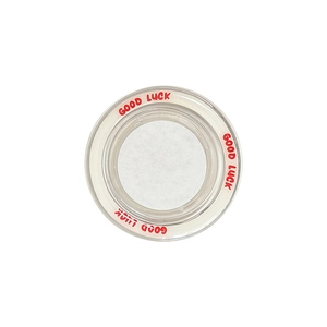 Transparent round magnetic phone socket base with red Good Luck text on white background