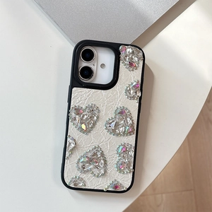 Detail of premium cream leather iPhone case featuring five colorful rhinestone hearts