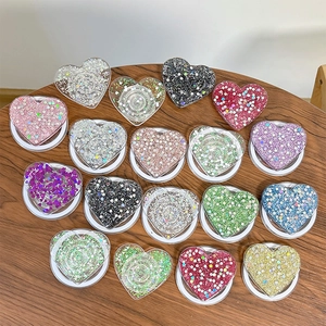 Magnetic heart-shaped phone socket grip with glitter and sequins in 18 vibrant colors