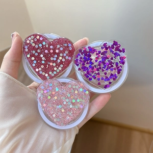Glitter heart magnetic phone socket set in red, purple, and pink for stylish grip