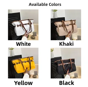 Vue détaillée des options de couleurs pour cabas contrasté en blanc, kaki, jaune et noir