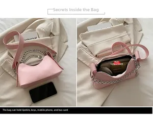 Pink PU shoulder bag detail showing interior main pocket capacity and chain strap
