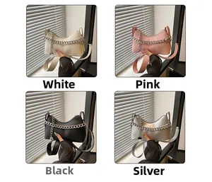 Detail showing minimalist half-moon shoulder bags with thick metal chain in four colors