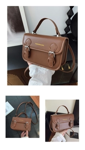 Detailed view of the brown vintage leather handbag with flap and metallic double buckles