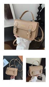 Detail of beige rectangular satchel with double buckle straps and FASHION & BAG gold logo