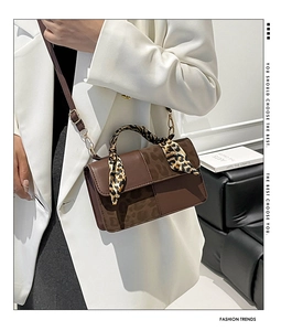 Brown contrast stitch handbag with leopard scarf detail shown as shoulder bag