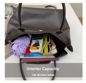 Detailed top view of large nylon tote bag interior showing spacious storage for essentials