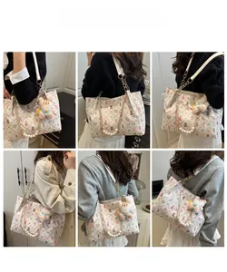 Detail shots of floral tote bag with pearl chain and cute bear plush pendant on model