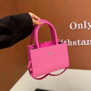 Rose red crocodile texture tote bag with top handle and adjustable shoulder strap