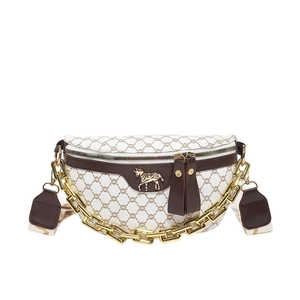 Vintage patterned saddle bag with gold horse ornament and chunky metal chain strap