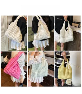 Collage of popcorn textured tote bags in four colors with cute white lace bow accents