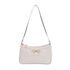 Elegante borsa a spalla baguette crema con fiocco dorato e ciondolo a fiore sulla zip