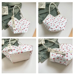 Multi-angle views of white tote bag featuring cherry print, lace bow, and spacious design
