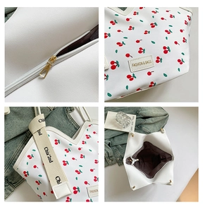 Detailed four-view shot of cherry print tote bag with zipper and wide woven strap