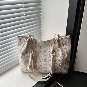 Waterproof tote bag with cute bear prints, featuring pearl gold chain and white straps