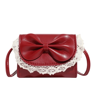 Red mini crossbody bag with a large bow and white lace trim for girls in ballet style