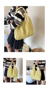 Detail of light yellow cloud puff tote bag with lace bow and bubble texture fabric