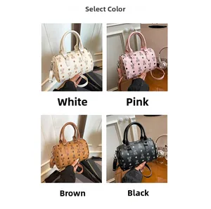 Detailed comparison of four cylindrical boston bags in white, pink, brown, and black colors