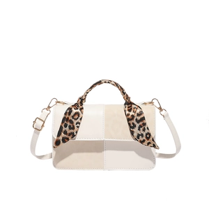 Minimalist beige and cream color-block square handbag with leopard print scarf handle