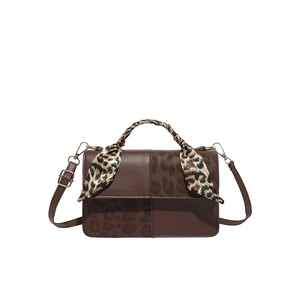 Chic dark brown square handbag with leopard print flap and matching handle scarf detail