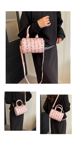 Three-way view of pink Boston bag with bear prints, shown as handbag and crossbody