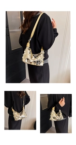 Close-up of crescent sequin underarm bag with yellow leather strap and party aesthetic