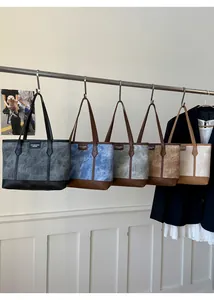 Detailed display of five color options for the stylish patchwork leather tote bag