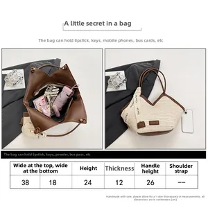 Detailed size chart for large straw tote bag with dimensions for handle and width