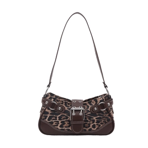 Y2K style leopard print shoulder bag with brown leather trim and metal buckle detail