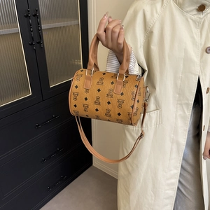 Vintage brown leather Boston bag with bear pattern print and adjustable strap