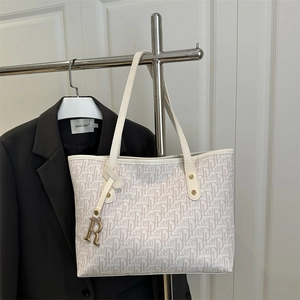 Large beige leather tote bag with letter print and golden R pendant for commuting
