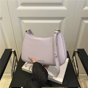 Chic lilac underarm shoulder bag with gold fashion lettering and smooth leather finish
