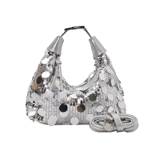 Silver sequin hobo bag with half-moon shape and adjustable shoulder strap for women