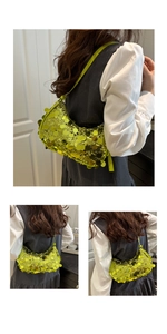 Detailed close-up of lime green sequined half-moon shoulder bag with reflective finish