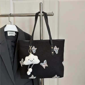 Large black tote bag with butterfly embroidery and cloud pendant on casual shoulder bag