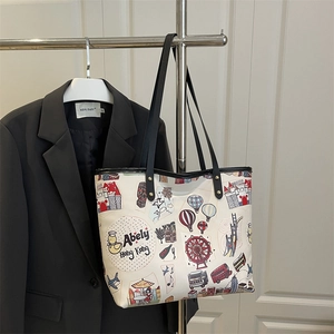 Grand sac fourre-tout crème avec illustrations colorées et doubles poignées noires
