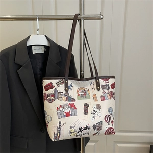 Sac fourre-tout avec motifs graffiti colorés et anses en cuir marron pour femme