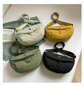 Matrix layout of four nylon saddle bags in beige, yellow, green, and black colors