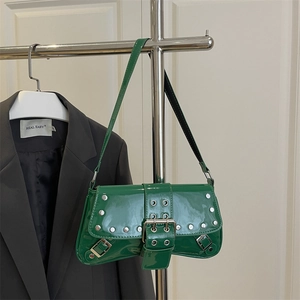 Chic emerald green patent leather underarm bag with silver rivet studs and metal buckle