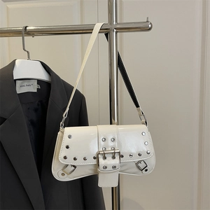 White glossy patent leather underarm bag with silver studs and punk style metal buckle