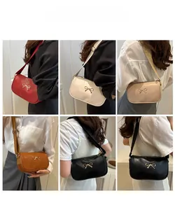 Collage of chic underarm bags in red, beige, apricot, brown and black with bow hardware