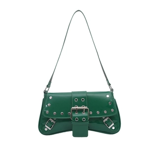 Green patent leather baguette bag with silver rivets and metal buckles in Y2K style